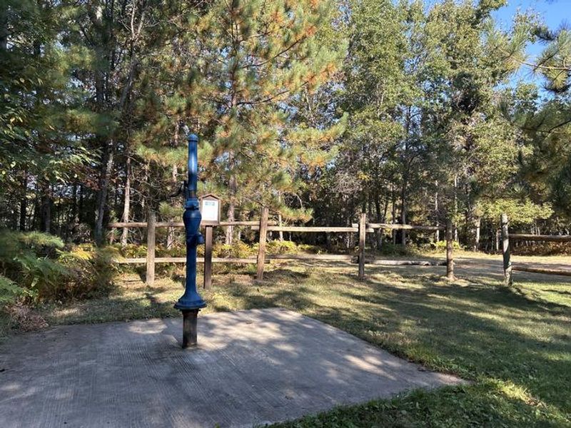 A photo of hand pump water Mack Lake ORV Campground