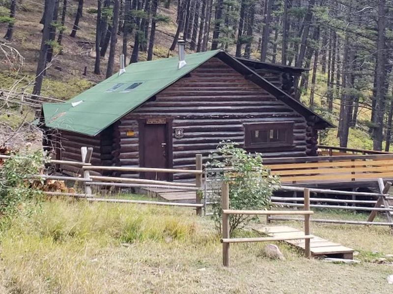 View of the front of Lost Horse cabin, Helena Ranger District.