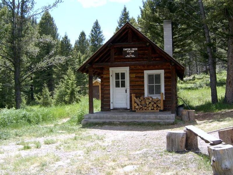 Summer - looking at the porch of the Canyon Creek cabin.