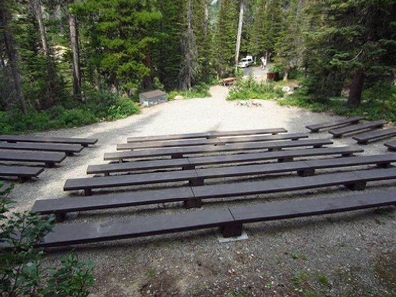 Attend an evening program at Two Medicine Campground Amphitheater