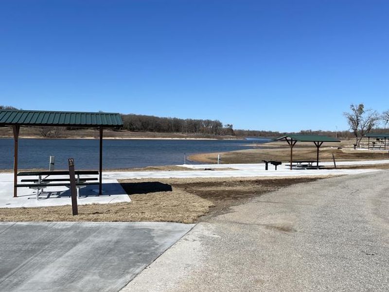 A photo of facility BURNS RUN EAST with Picnic Table, Electricity Hookup, Fire Pit, Shade, Water Hookup