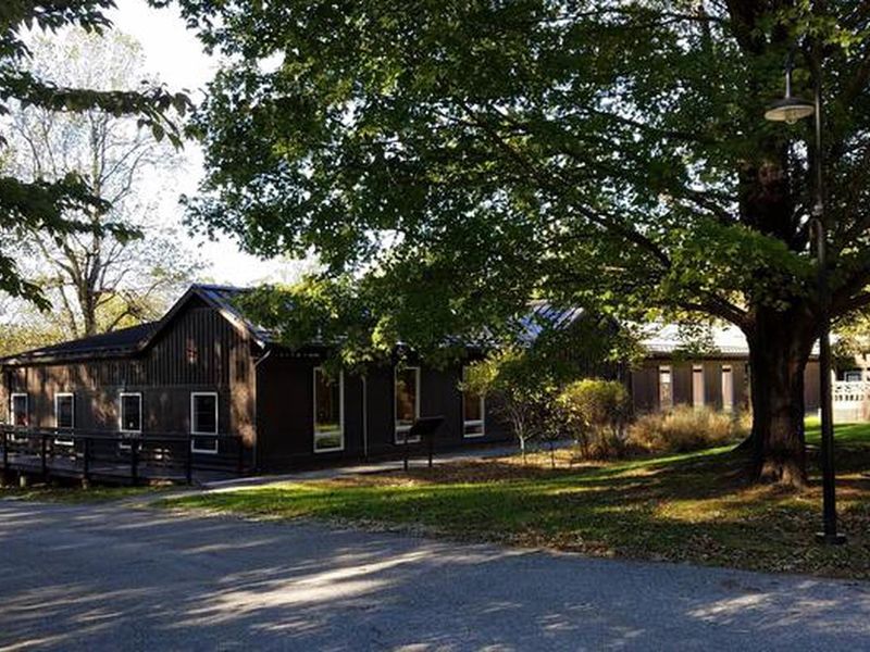 The dining hall facility has air conditioning and heat.  It includes a commercial kitchen, appliances, tables, chairs, and cleaning equipment.  