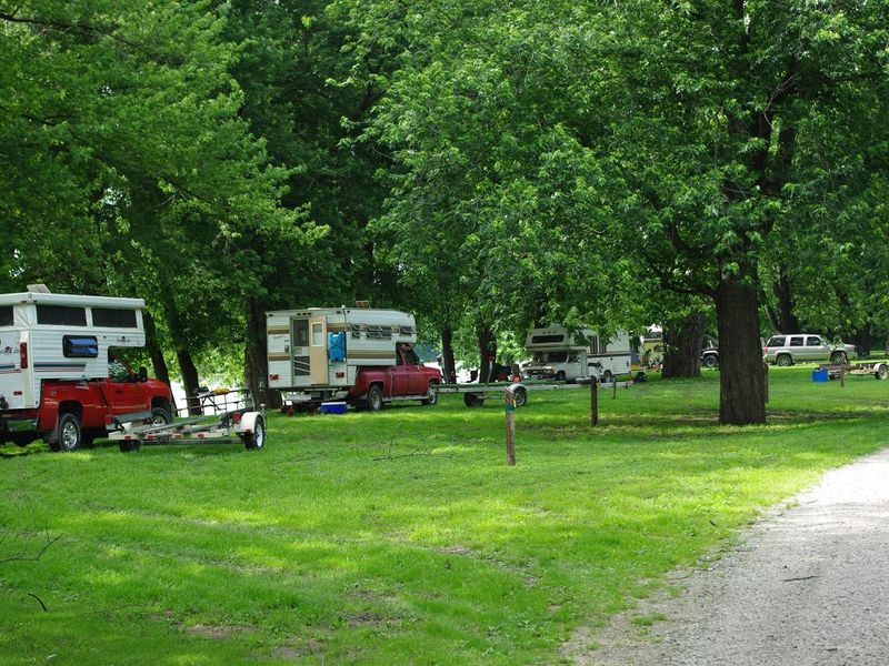 Pickup Truck Campers along river campsites