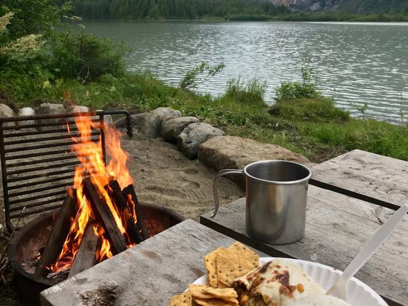 Food and fire at picnic table