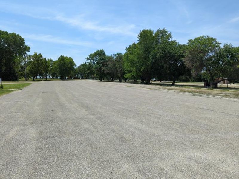 The small boat launch parking lot located directly across from the boat launches