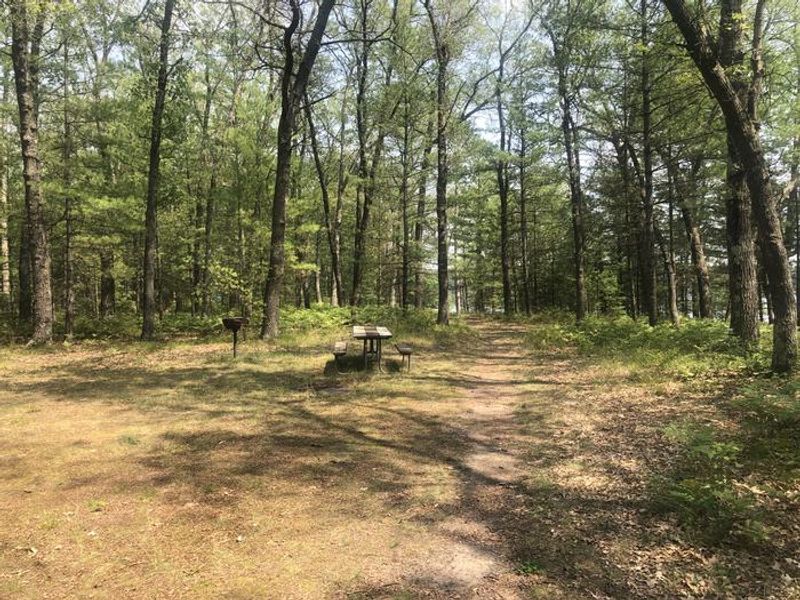 A photo of facility ROUND LAKE with Picnic Table, Fire Pit