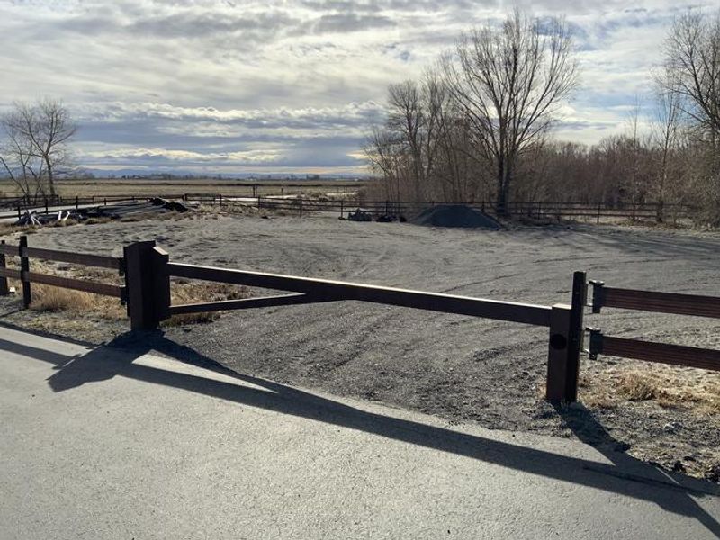 Overflow parking area for tow-vehicles to ease space within campsites 