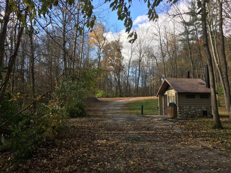Vault restroom along walking trail