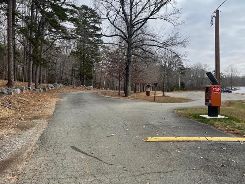 Welcome to Grassy Creek! This is a fee area and requires you to pay the day use entry fee at the orange fee machine on the right hand side of the photo.