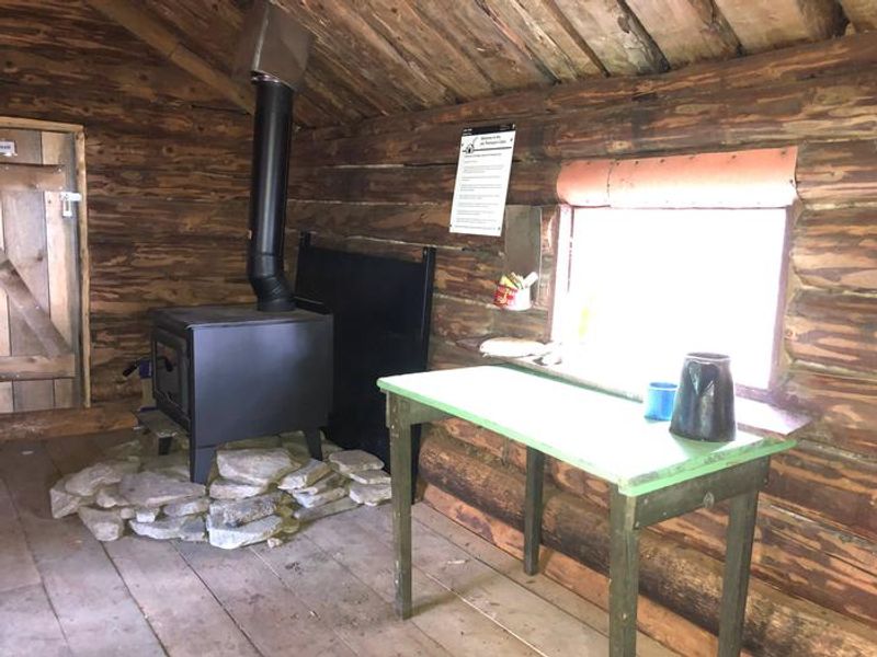 Wood stove and kitchen prep table.
