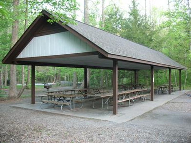 View of picnic tables under pavilion area