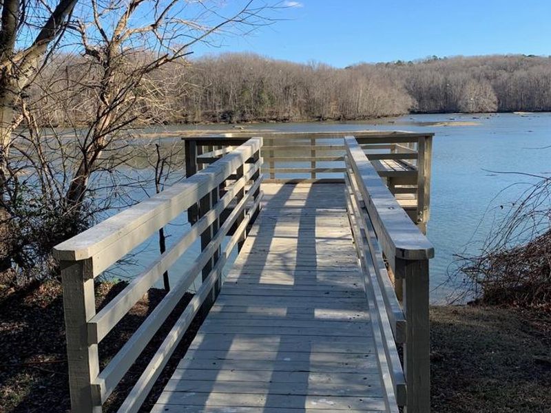 Welcome to Tailrace Park! This is the handicap accessible fishing pier located below the shelter. Come press your luck on trying to catch the new world record blue catfish!