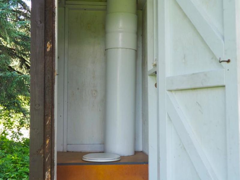 Outhouse interior of Shakes Slough 2 Cabin 