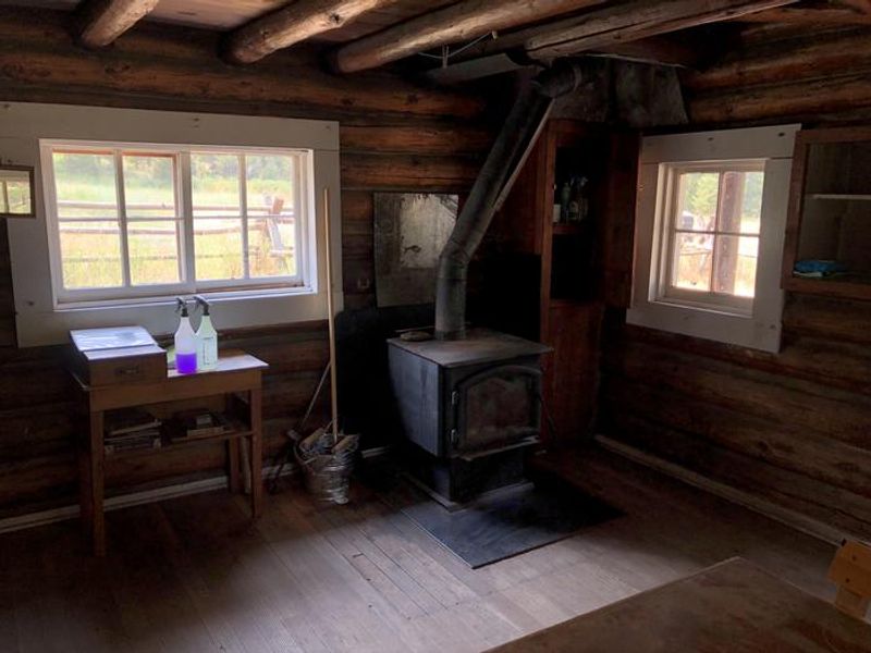 Wood stove for heat and cooking - please only use provided wood for inside the cabin.