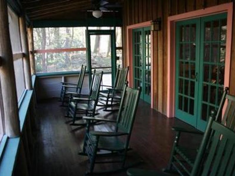 Porch with rocking chairs at Spence Cabin