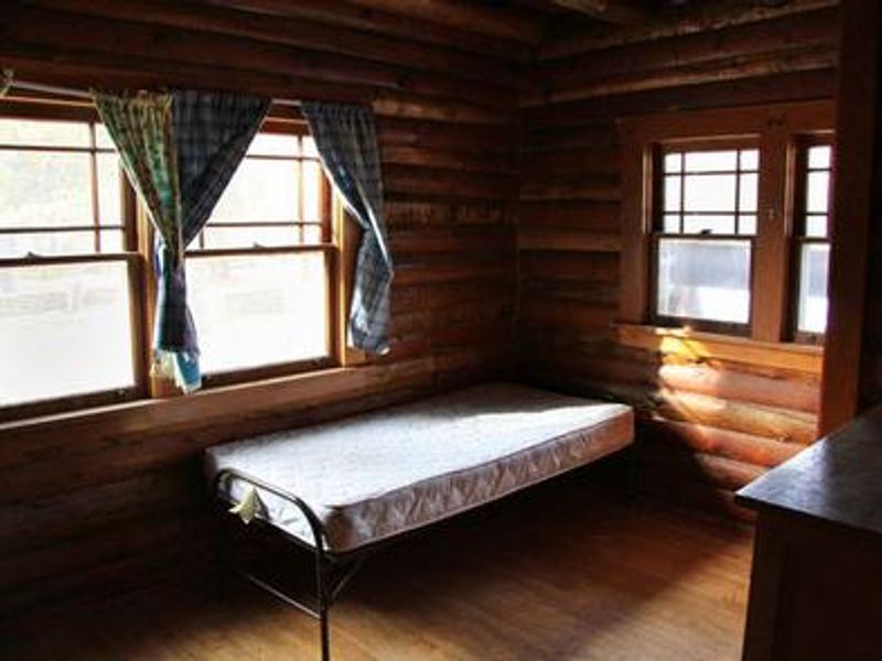 Single bed inside a cabin