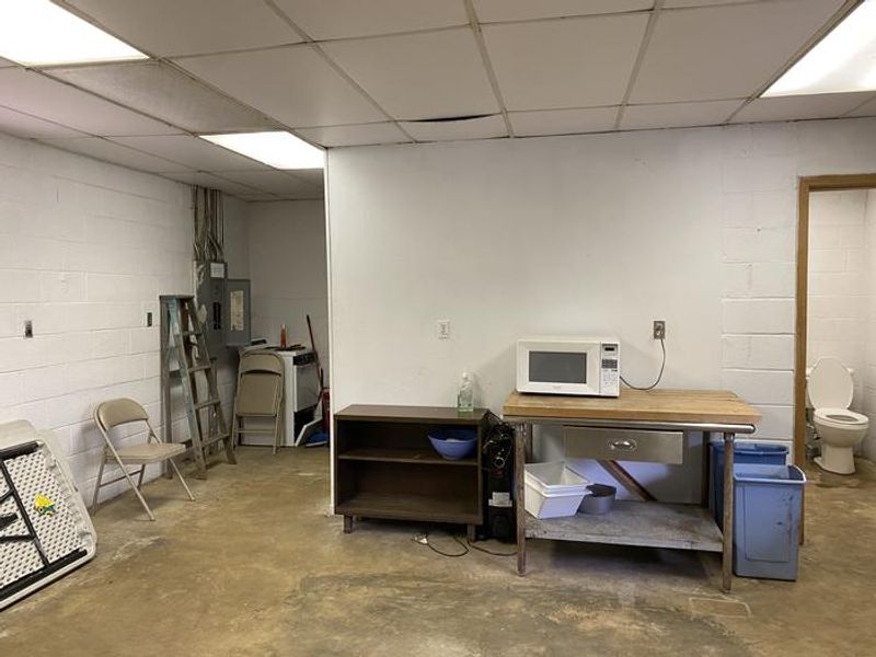 2 bathrooms and a microwave are located inside the pavilion.