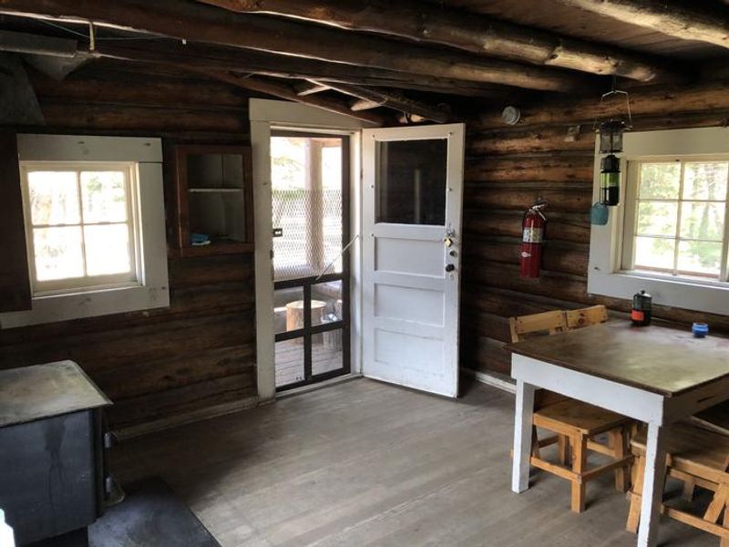 Interior view of cabin entrance and table
