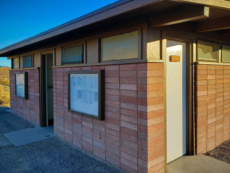 Two restroom buildings with flush toilets are available.