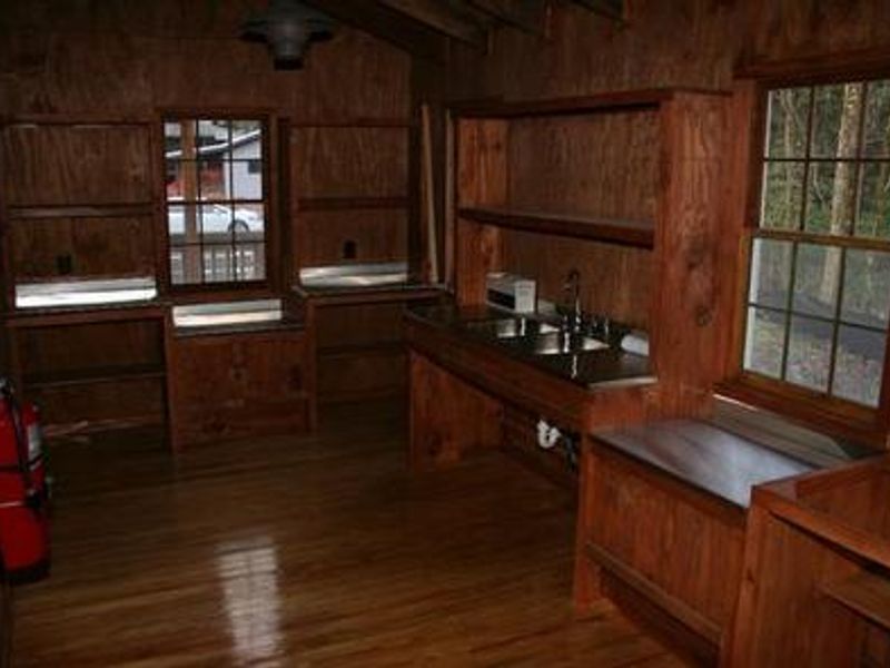 Sink, counter space and storage shelves in Appalachian Club House