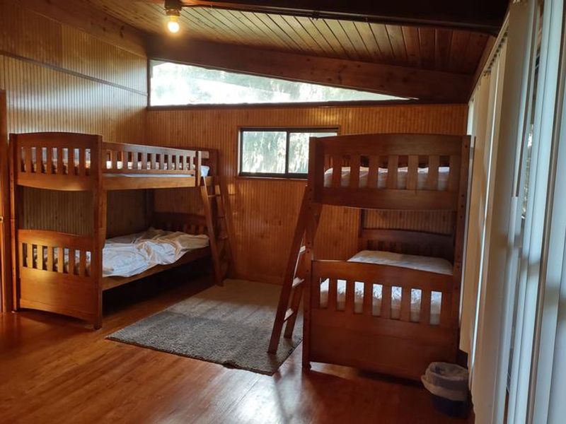 This bedroom sleeps 4 on two sets of bunk beds