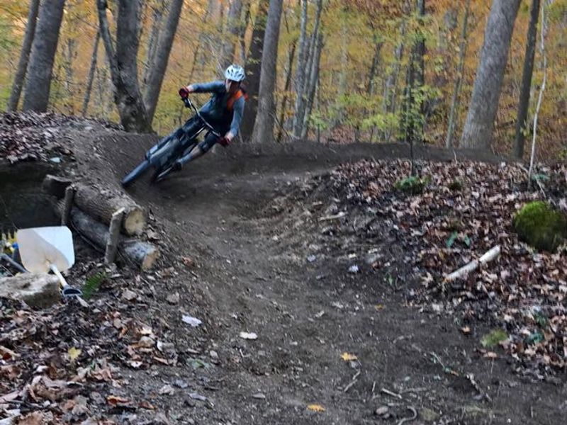 Mountain biker enjoys the challenges within the Sugarcamp trail system. 