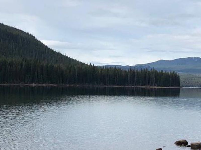 Looking out over Cultus Lake towards the Three Sisters Wilderness