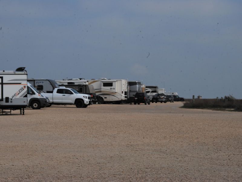 Camping side by side with unobstructed views of Laguna Madre, its wildlife and windsurfers.