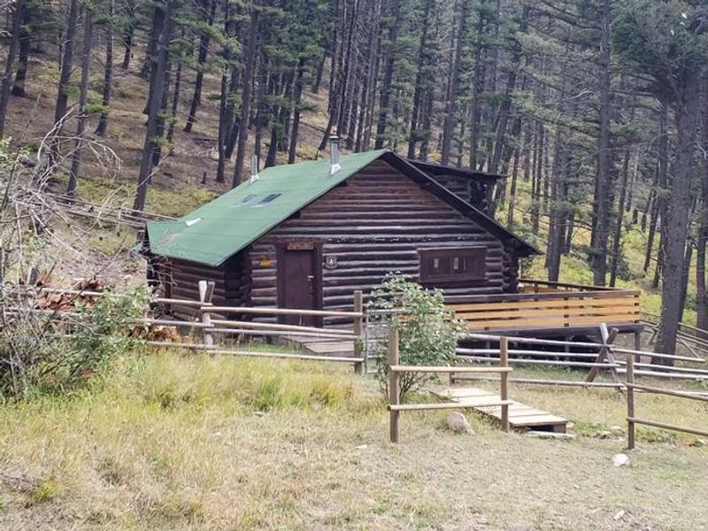View of the front of Lost Horse cabin, Helena Ranger District.