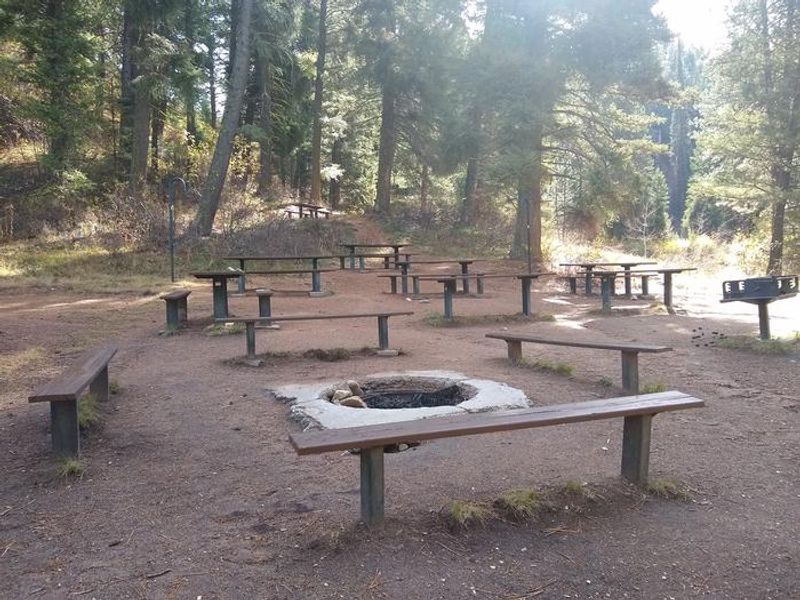 Another look at main group campfire, grill, and dining area.