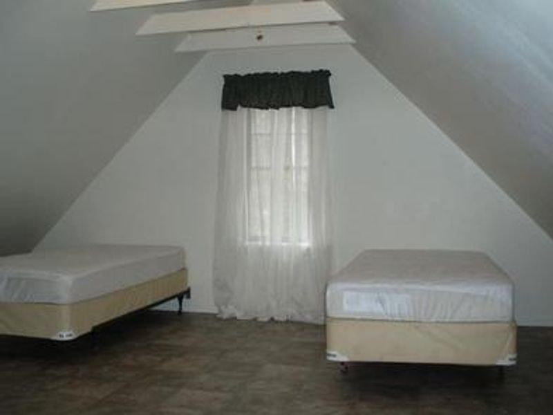 Four can sleep upstairs on the twin beds.