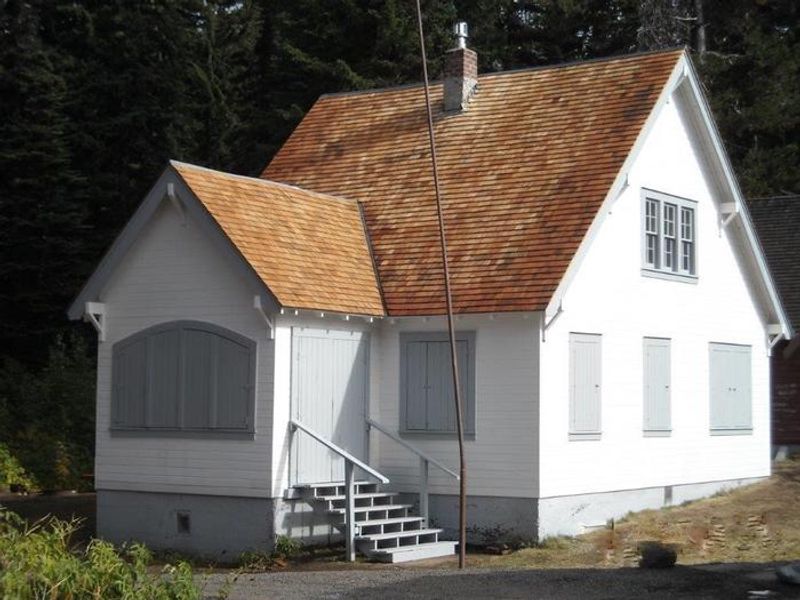 White cabin with gray trim