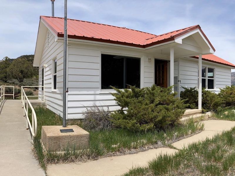 Orange Olsen Dwelling front and ramp.