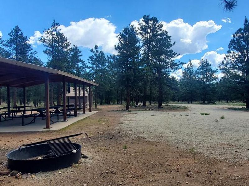 One large communal firepit.  
Six other firepits and tables location at the satellite sites within the group site