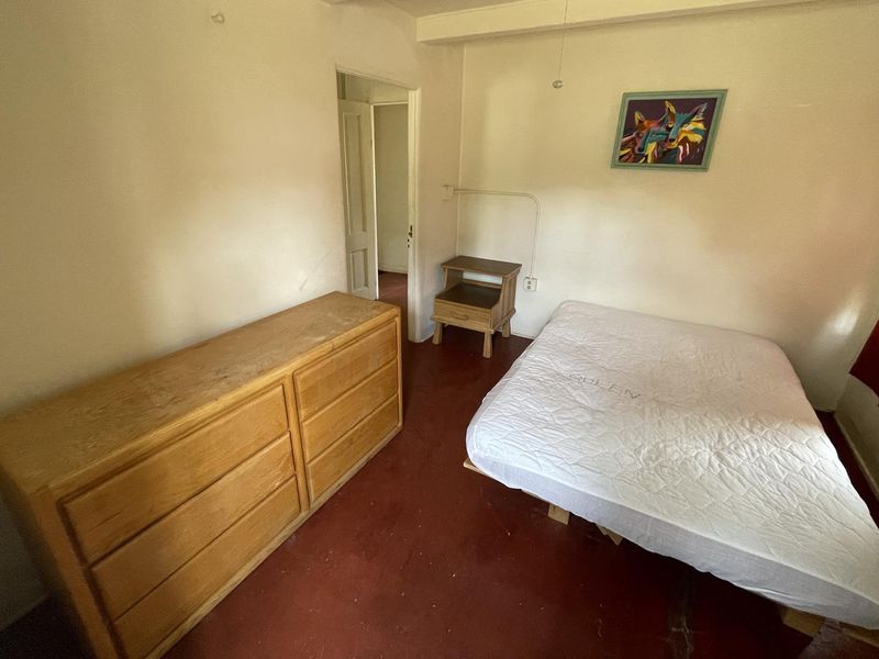 1st bedroom of Shaw House. Queen Bed.