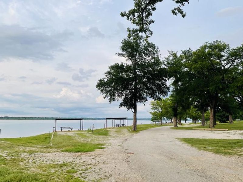 A photo of facility JUNIPER POINT with Picnic Table, Electricity Hookup, Fire Pit, Waterfront, Water Hookup