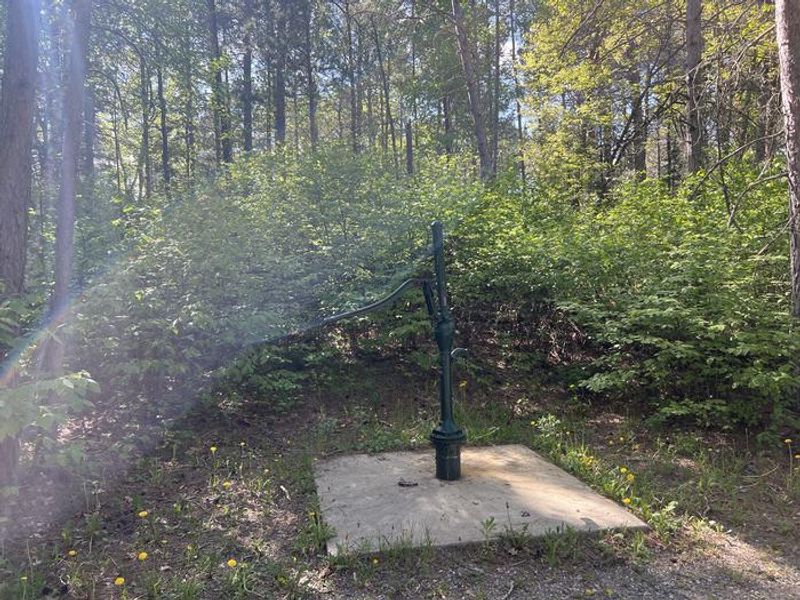 A photo of water pump at ONEGUME with No Amenities Shown