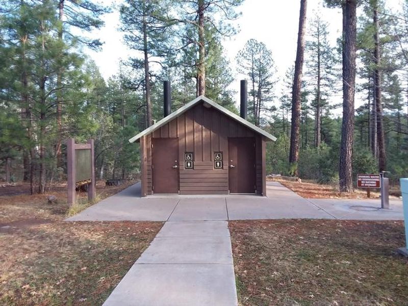 Sharp Creek Campground Loop Oak Vault Toilets with a Water Spigot to the right