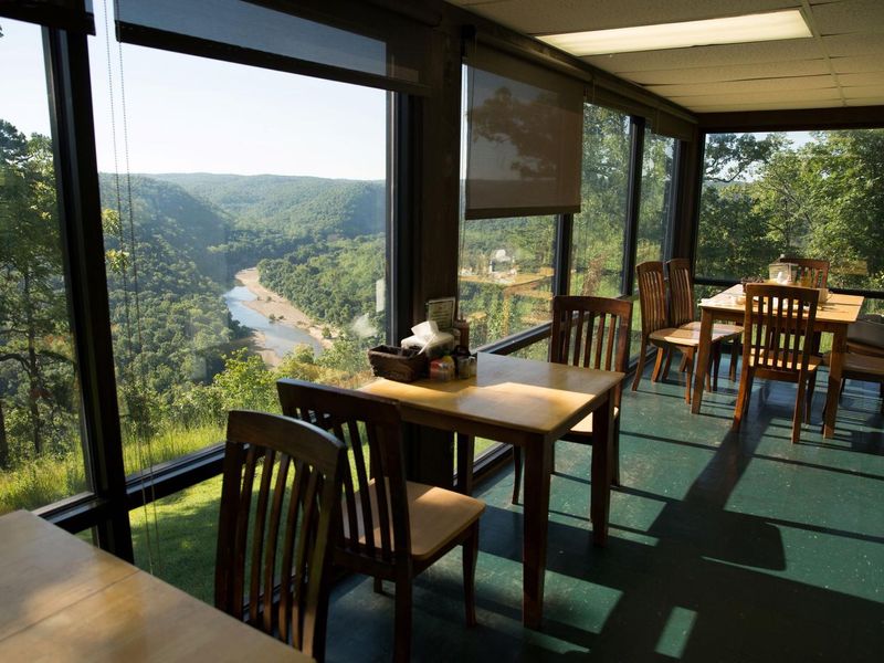A view overlooking the Buffalo River as seen through the window at the Buffalo Point Restaurant.