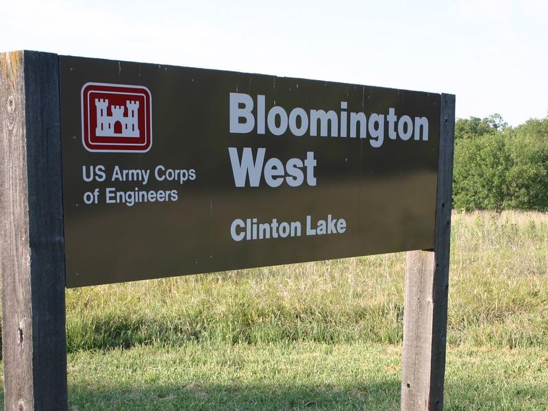 Bloomington West Park offers a day use with a boat ramp and restroom as well as a spacious group campground that sits under an umbrella of trees west of Clinton Dam and Lake in the hills of Kansas. This group site offers 25 individual sites, four with 20/30 Amp electric and water connections. This area has a total capacity of 150 guests. A boat ramp is located within a mile of the site, and grills, flush toilets, showers and drinking water provide a comfortable camping experience.