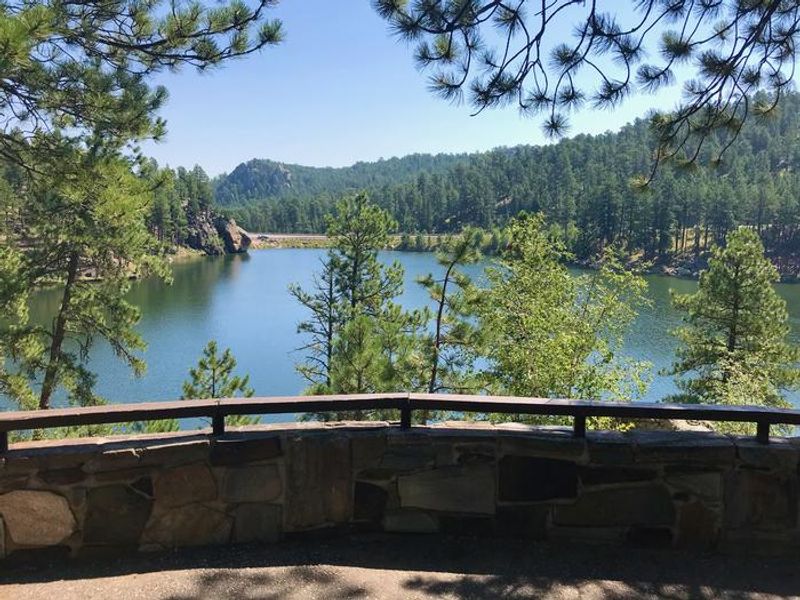 Retaining Wall overlooking lake near tent site area