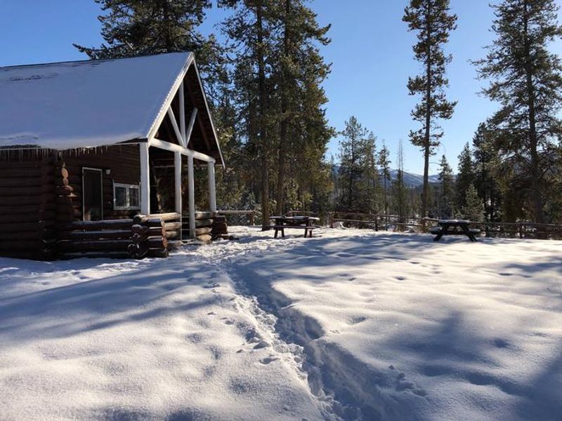 Front entrance of Stolle Meadows cabin winter