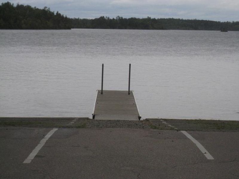 Boatlanding containing dock, access ramps, canoe landing, and large parking area.