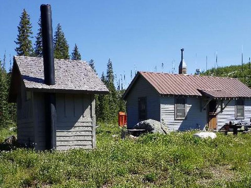 Historic Seedhouse Guard Station, 1 picnic table, vault toilet, fire pit - available for rent fall & winter. Sleeps maximum 5 people.