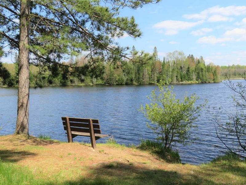 Bench on the lake shore at Picnic Point