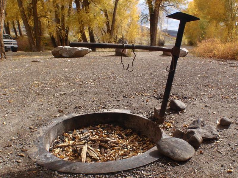 fire pit with swing arm for cauldron