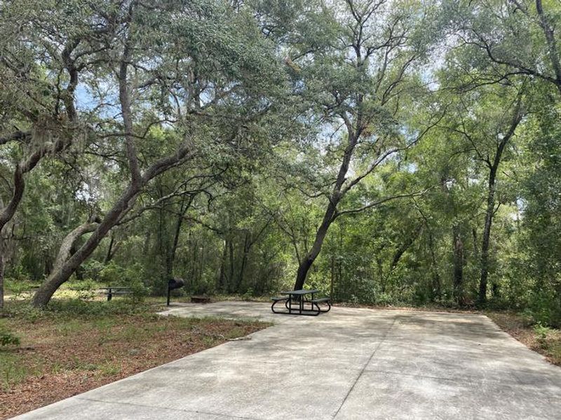 A photo of facility Big Bass Campground with two ADA campsites. 