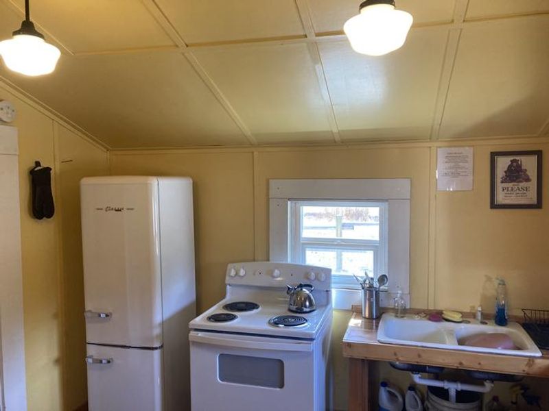 Range, refrigerator, and sink