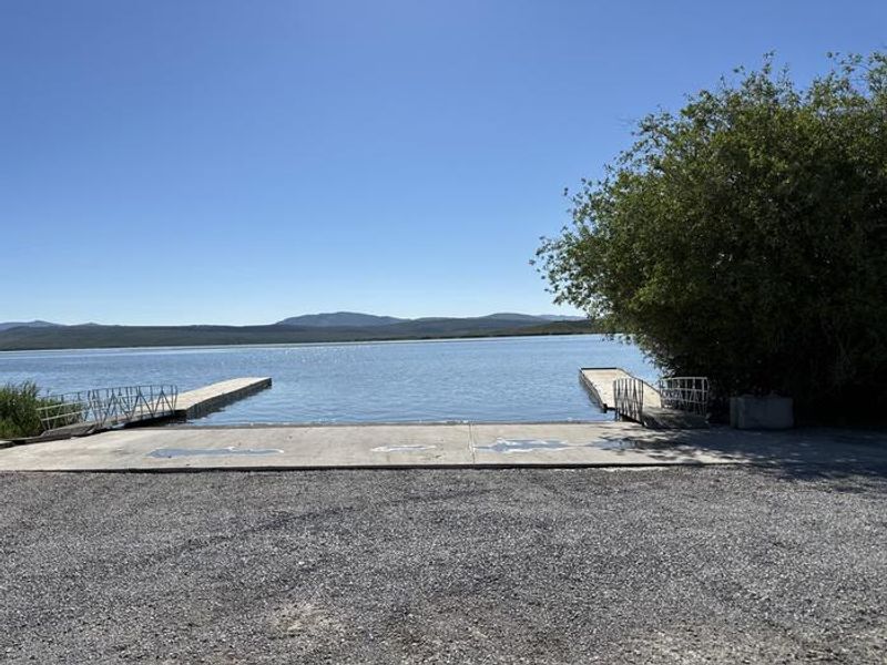 Blackfoot Reservoir concrete boat ramp with accessible boat docks.