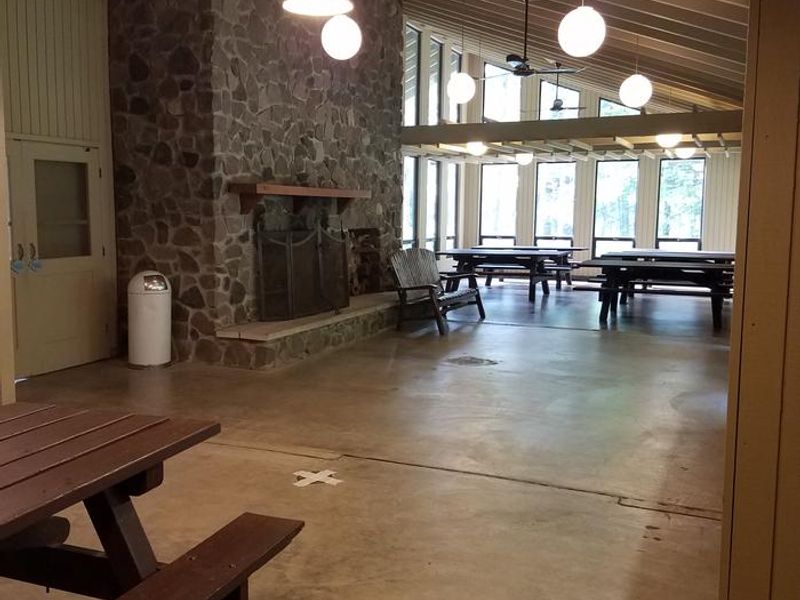 Inside of the Clark Lake pavilion from the north end of the room.